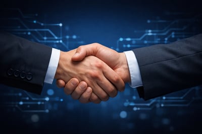 The image features two hands clasping for business agreement The background is in dark blue tone with some electronics connections little bit visible-1