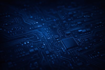 The image is a rich dark blue subtly illuminated to reveal faint intricate electronic connections that hint at a modern technological theme-1